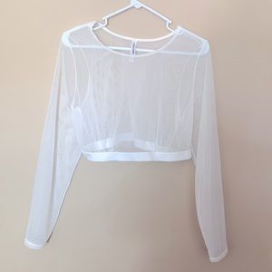 Never worn , White see through top.